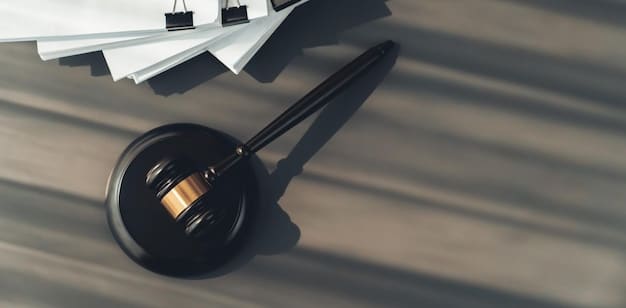 A close-up of a gavel hitting a sound block, with legal documents blurred in the background, symbolizing new legal frameworks and regulations affecting the real estate industry.