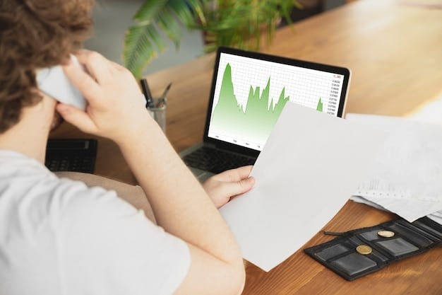 A person's hands using a laptop with stock market charts and graphs displayed on the screen, along with the logos of different brokerage firms in the background. This visualizes the process of selecting a brokerage account.