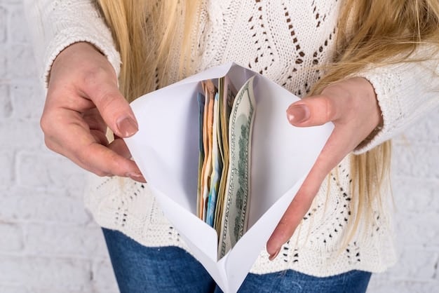A person organizing their wallet with various envelopes neatly tucked inside, highlighting how the envelope system can be easily integrated into daily life.