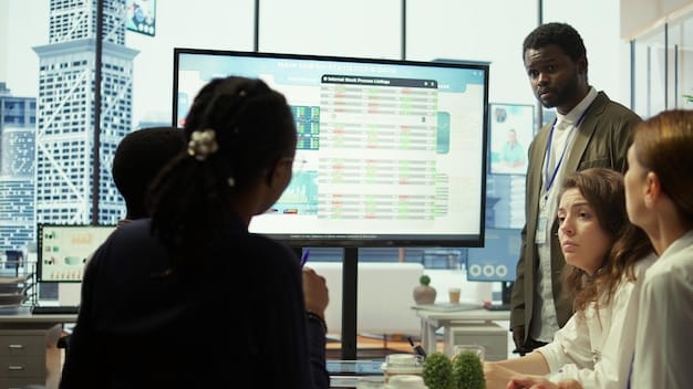 A diverse group of business professionals in a modern office looking at a screen displaying a graph with an upward trend, indicating positive business growth amidst new tax regulations.