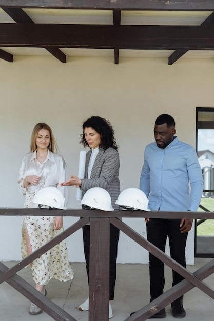 A diverse group of people attending an open house, looking at a property with a real estate agent, showing active market interest.