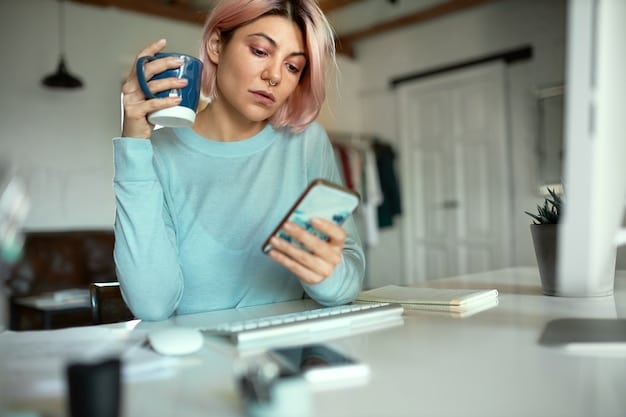 A person on the phone, looking stressed, with a credit card statement and phone bill spread out on a table, suggesting a conversation with a creditor.