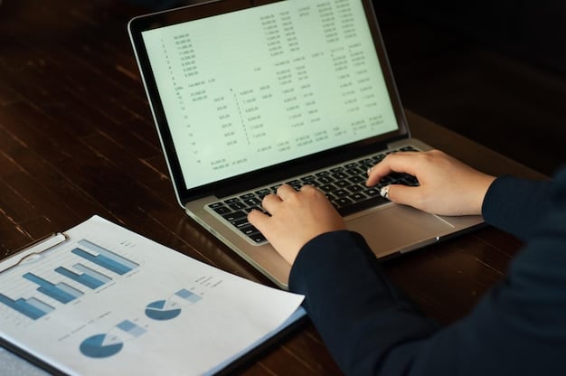 A detailed financial spreadsheet on a laptop screen, with a hand pointing to specific data. The background is a clean, modern office setting, implying precision and professional planning.