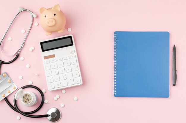 A calculator on a desk next to a health insurance pamphlet, with coins scattered around, symbolizing financial planning for healthcare costs.