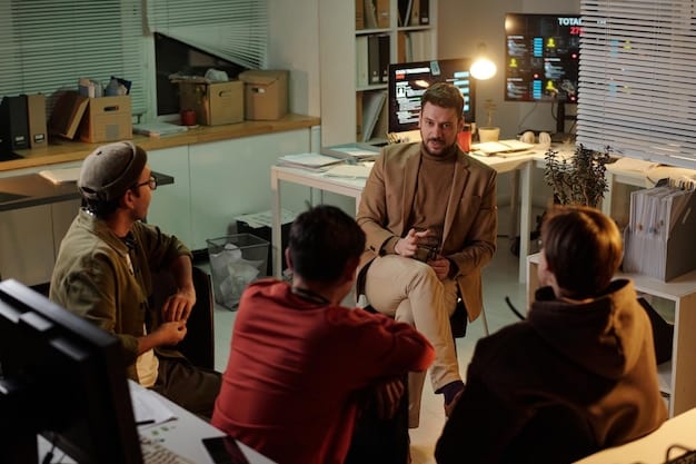 A student learning coding and cybersecurity concepts in a modern classroom, with lines of code displayed on a screen and collaborative discussion happening.