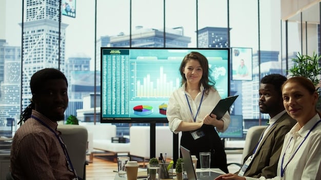 A diverse group of business professionals in a modern office collaborating around a table, analyzing financial reports and projections on a large screen displaying economic charts.